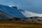Close up view of pen y fan brecon during winter season with snow on the peak of the mountain with many walkers enjoying