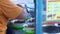 Close-up view of a penjual mie ayam bakso or meatball chicken noodle seller who is making chicken noodles