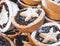 Close-up view of a pile of delicious Christmas mince pies with sugar powder on top