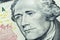 Close up view Portrait of Alexander Hamilton on the one ten dollar bill. Background of the money. 10 dollar bill with Alexander Ha