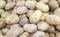 Close up view of potatoes at a market