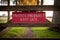 Close-up view of a Private Property sign seen nailed to the gated entrance to a farm track