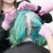 Close-up view of process of hair dye in professional beauty salon
