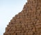 Close-up view of a pyramid made of roughly hewn sandstones and sandstone blocks in Sudan