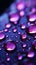 Close up view of raindrops on a window, kissed by purple light