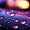 Close up view of raindrops on a window, kissed by purple light