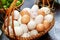 Close-up view of raw chicken eggs and duck eggs with write hand smile, Fresh farm egg in Thailand