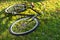 close up view of retro bicycle lying on green grass