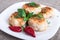 Close Up view on rissole of minced chicken on a white plate