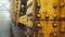 Close Up View of Rusty Yellow Industrial Machinery with Rivets on a Foggy Day