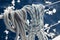 Close-up view of sailboat ropes at sunny weather, pulleys and ropes on the mast, Yachting sport, ship equipment, sea is