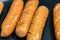 Close Up view of sausages fried in a pan, Sensitive Focus,