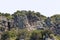 Close-up view of a section of a jaggy mountain crest. Rock, mountaineering.