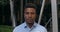 Close up view of serious handsome afro american businessman in shirt looking to camera. Portrait of successful male