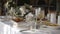 Close up view of served banquet table prepared for celebration. Made for wedding or engagement banquet there are glasses