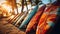 Close-up view of several colorful bright surfboards lying