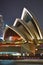 Close up view of a single precast concrete shell of Sydney Opera House at night