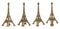 Close up view of a small Eiffel tower statue photographed with different perspectives