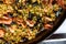 Close up view of a Spanish seafood paella: mussels, king prawns, langoustine
