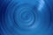 Close-up view spiral lines of trendy phantom blue color, abstract background of infinity with copy space