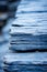 a close up view of a stack of blue slabs
