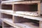 Close-up view of stacked wooden pallets. Wood construction materials