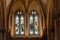 Close-up view of a stained glass window inside the historic Wells Cathedral