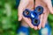 Close up view Teen boy playing a fidget spinner outdoors