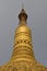 Close up view of tip of common giant stupa in pagoda in Myanmar