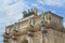 Close up view to statues on Arc de Triomphe du Carrousel in Place du Carrouse yard