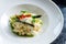 Close up view on tradtional and tasty risotto with parmesan, asparagus and chili. Mediterranean and italian cuisine. Soft,