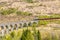 A close up view of a train approaching the viaduct at Glenfinnan, Scotland