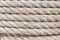 Close up view of twisted rope made of sisal. Background