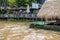 A close-up view of a vetiver thatched roof hut.