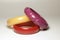 Close up view of vintage bakelite bangle bracelets on white background