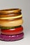 Close up view of vintage bakelite bangle bracelets on white background