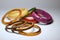 Close up view of vintage bakelite bangle bracelets on white background