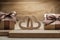 Close up view vintage wood hearts and gift boxes on wooden background