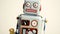 Close-up view of a walking retro wind-up robot toy