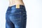 Close up view of woman buttocks with jeans