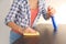 Close up view of woman cleaning furniture