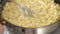 Close up view of woman hands cooking carbonara pasta