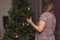 Close up view of woman unloading Christmas tree. Sweden