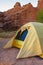 Close up view of yellow camping tent in southwestern desert canyon in San Lorenzo Canyon, New Mexico, USA