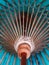 Close-up of vintage blue paper umbrella or parasol.