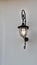 Close up of vintage lighting fixture attached on wall