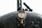 Close-up of a vintage steam pressure gauge seen on a steam boiler.