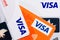 Close-up of Visa plastic credit payment cards with contactless pay symbol top view