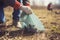 close up of a volunteer collecting rubbish from a park. Generative ai