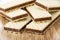 Close up of wafers with porous chocolate on table